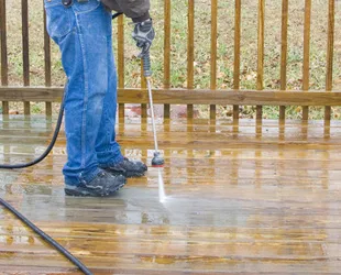 Power Washing a wooden deck in back garden